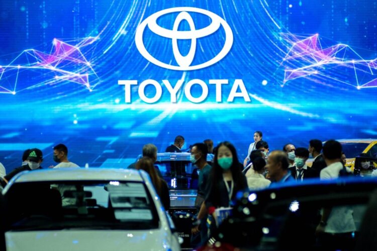 Visitors gather at the booth of the Toyota during the 44th Bangkok International Motor Show in Bangkok, Thailand, March 23, 2023. REUTERS/Athit Perawongmetha